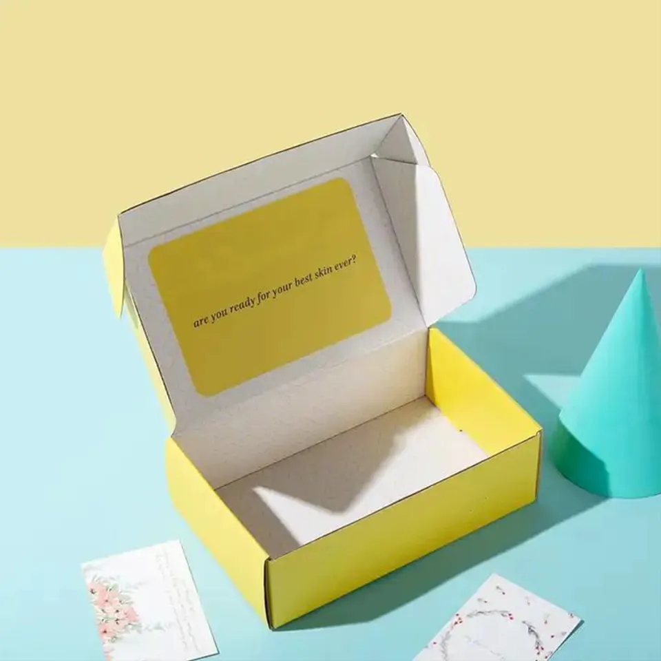 Double Sided Printed Mailer Boxes: Yellow outside, white inside, with a yellow message panel printed under the lid