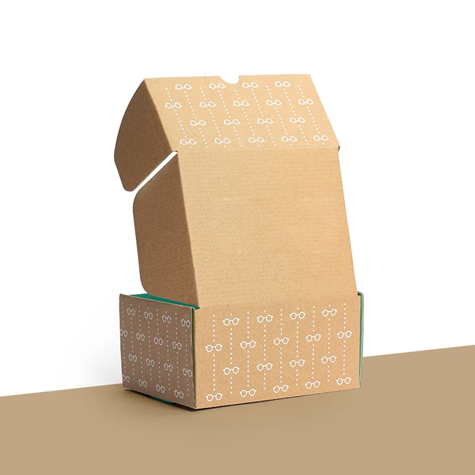 Double Sided Printed Mailer Boxes: Kraft box printed in white with a small repeat pattern outside and inside the lid