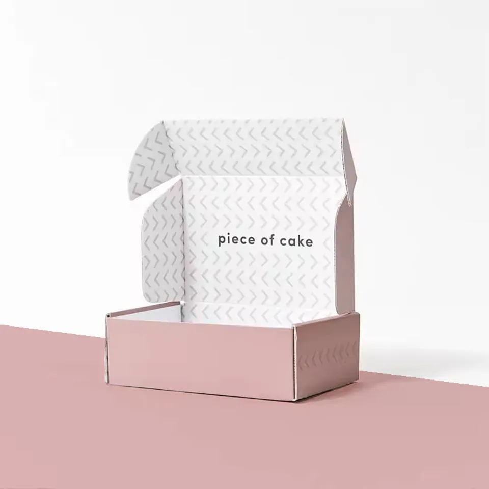 Ear Lock Mailer Boxes: Pale pink box standing open, its white lid lining printed with a grey chevron pattern