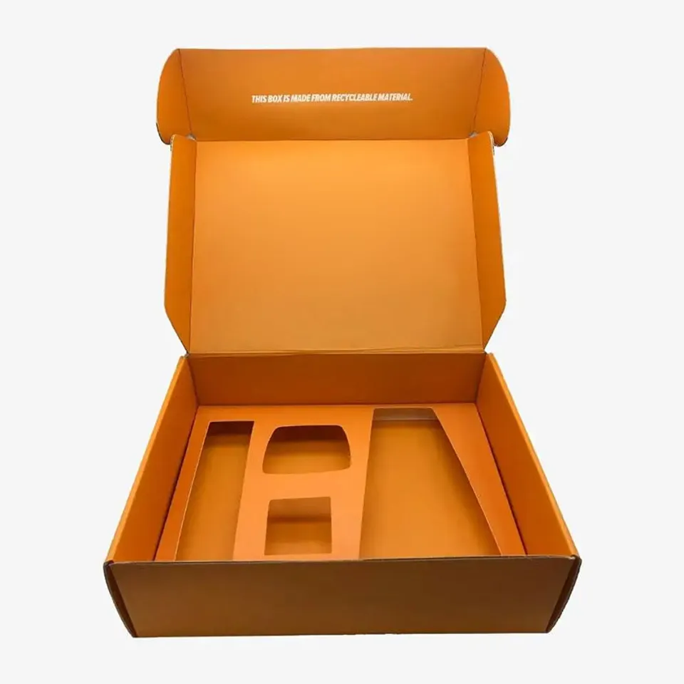 Insert Fitted Mailer Boxes: Orange box printed inside and out, insert cut with three openings of different shapes