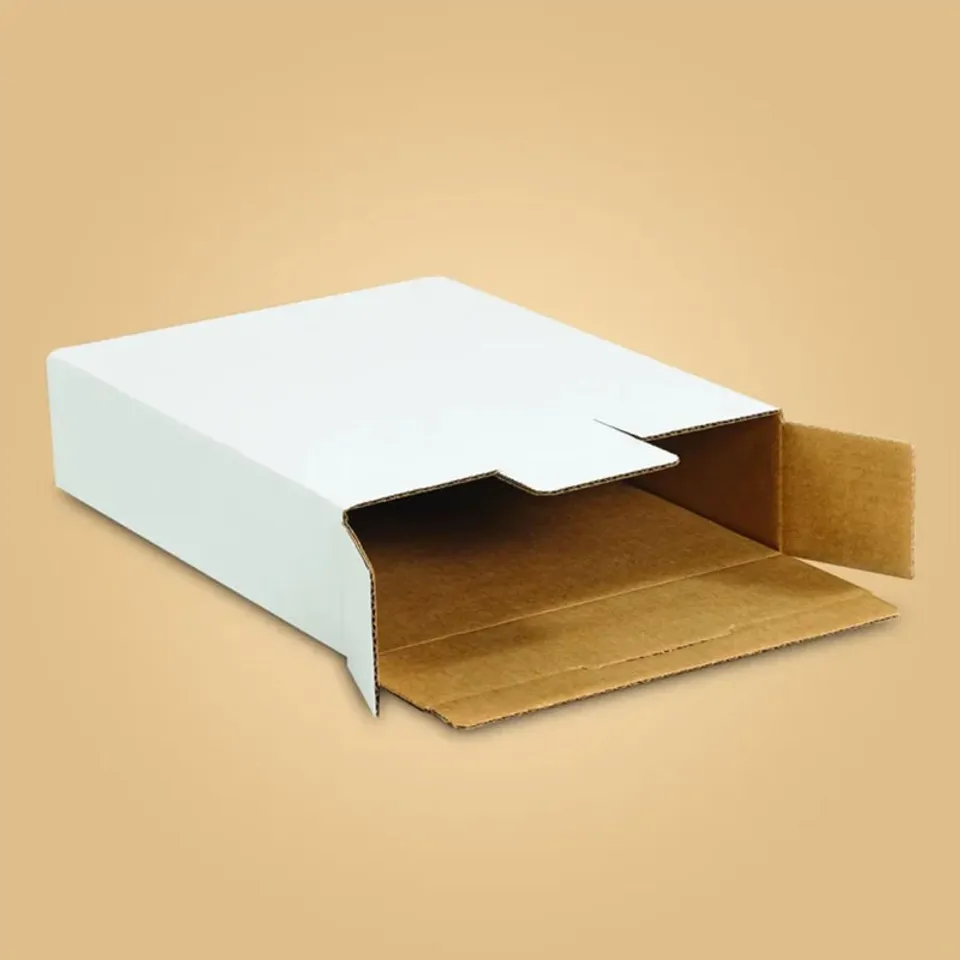 Side Loading Tab Lock Mailers: White mailer with a kraft inside, end flap and locking tab folded open for loading