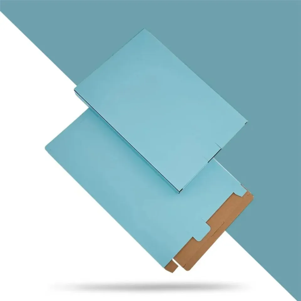 Side Loading Tab Lock Mailers: Two pale blue flat mailers, one turned to show the kraft tab lock flap at its end