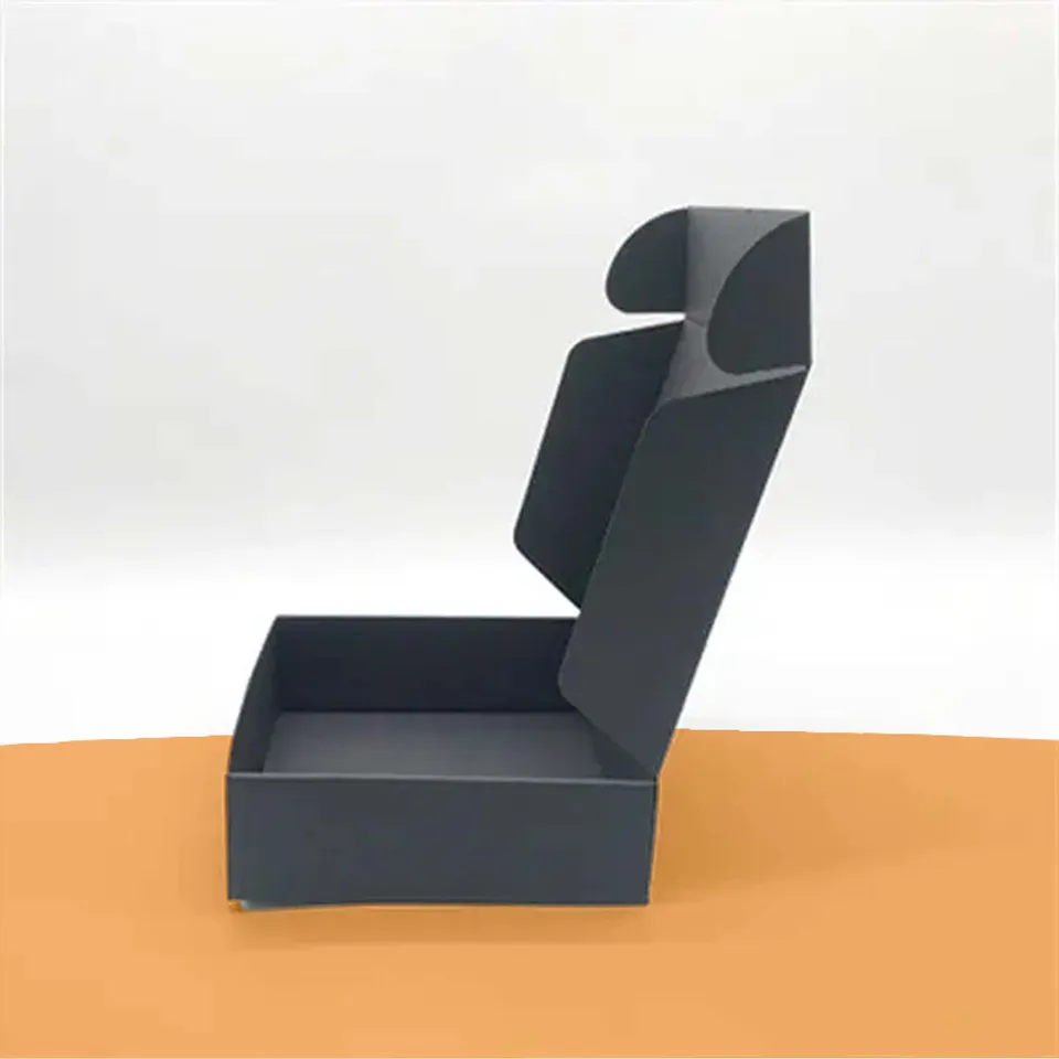 Tuck Top Mailer Boxes: Plain dark grey tuck top mailer standing open with its rounded side flaps raised